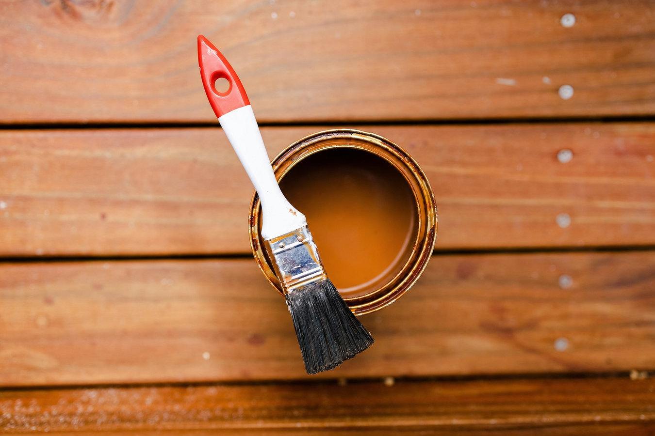 Deck staining and sealing